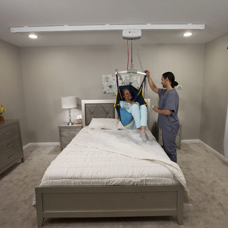 Handicare C-625 Fixed Ceiling Lift with load