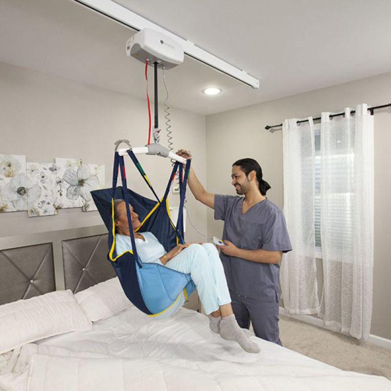 Handicare C-625 Fixed Ceiling Lift with patient