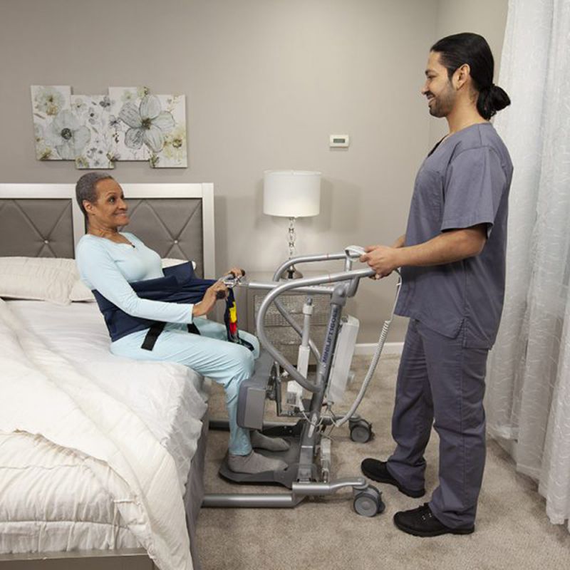 Handicare MiniLift Sit-to-Stand Floor Lift with load