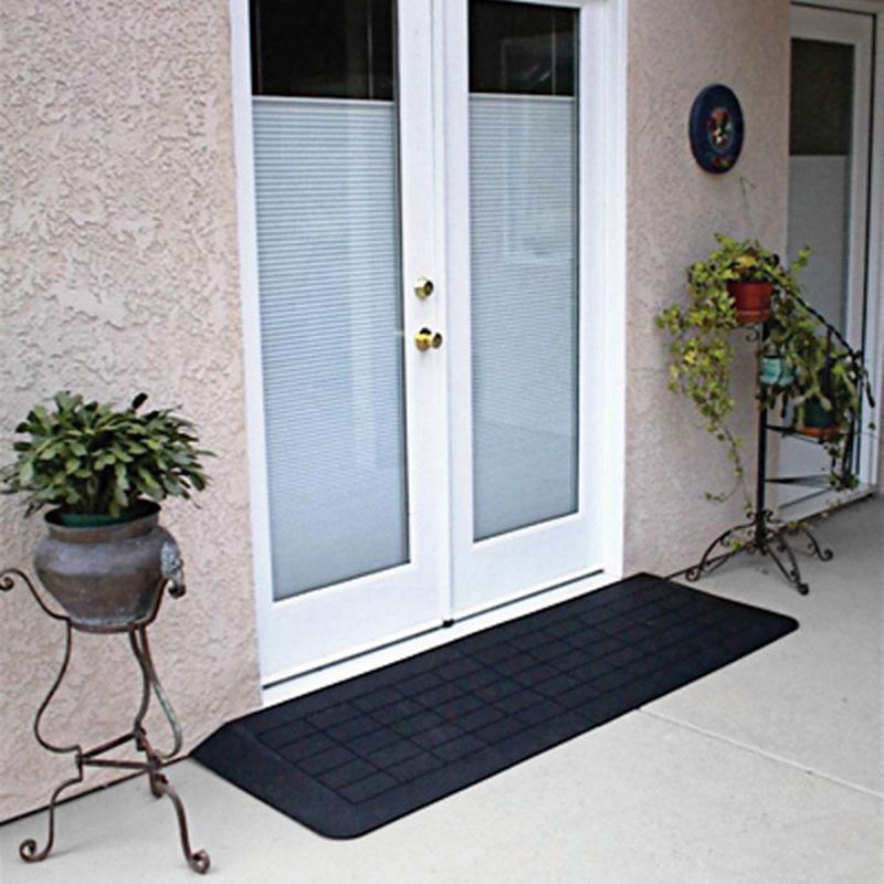 PVI Rubber Threshold Portable Ramps in front of elevated door